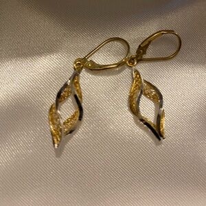 Gold plated 2 toned earrings. Never worn